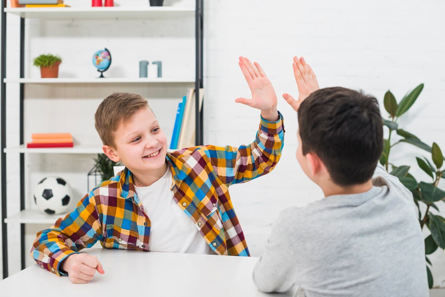 Parent and child celebrating progress together